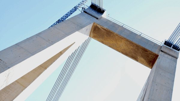 Low angle shot of bridge's concrete beam by Ermelinda Maglione from Pexels via Canva